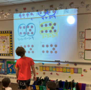 1st graders engaging in a Dot Talk
                  